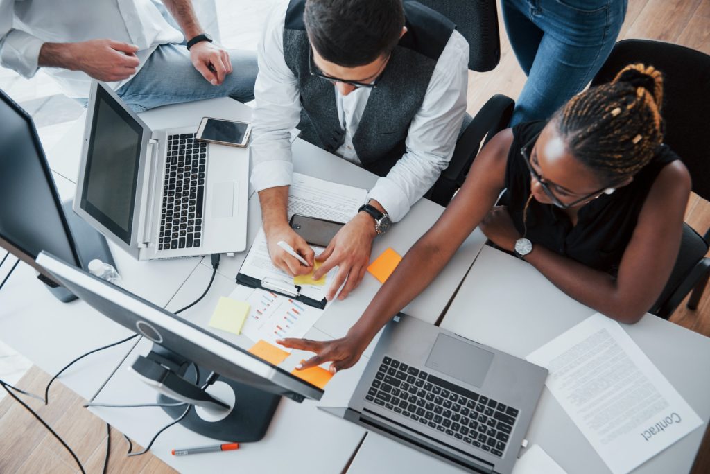 A group of multinational busy people working in the office
